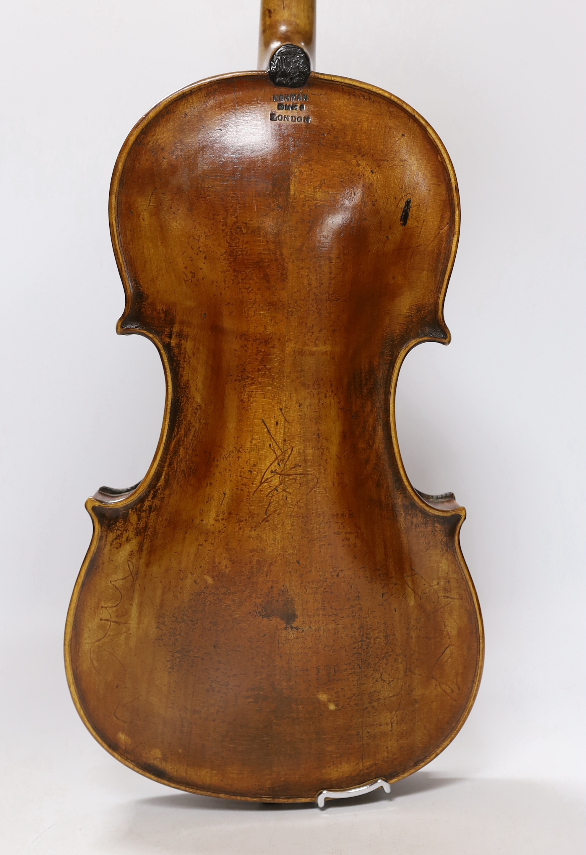 An early 20th century English violin stamped Norman Duke, London, one piece back with wax seal, cased, violin 60cm long
